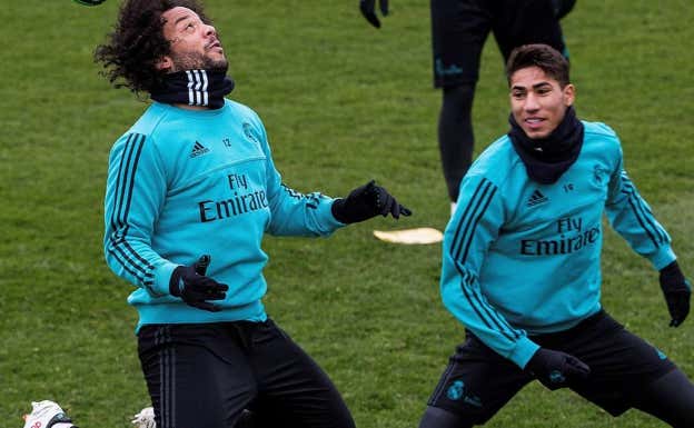 Achraf con Marcelo en su etapa en el Real Madrid. Efe