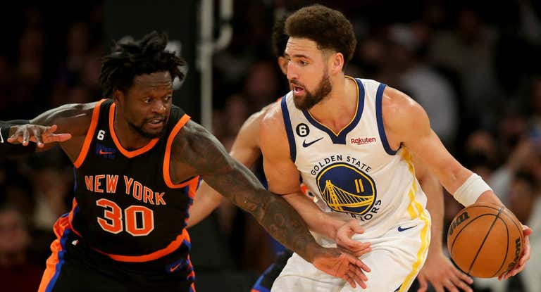 Julius Randle y Klay Thompson durante el último partido disputado en el Madison entre Knicks y Warriors.