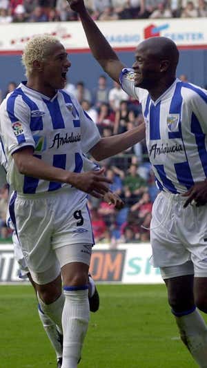 Darío Silva y Dely Valdés, en un partido del Málaga.