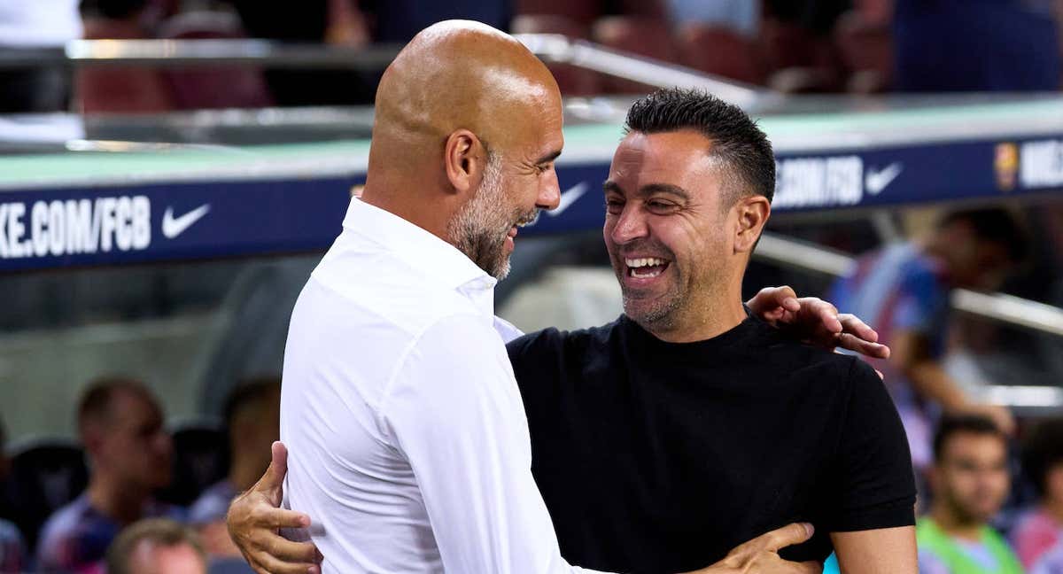 Guardiola y Xavi, durante su saludo en el amistoso Barça-Manchester City a principios de temporada. /GETTY