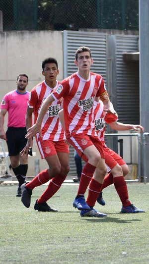 Iván y Álvaro durante un partido con el Girona. IMAGEN CEDIDA POR IVÁN RODRÍGUEZ