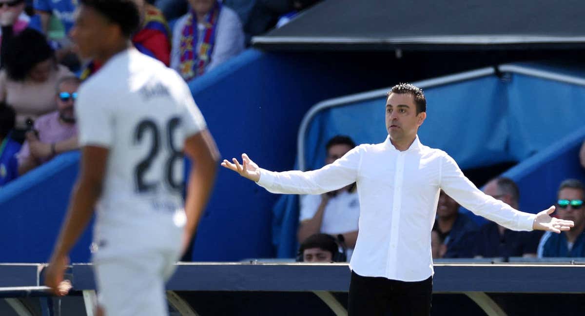 Xavi Hernández, durante el partido ante el Getafe. /REUTERS