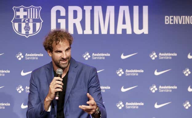 Roger Grimau en su presentación con el Barça. Efe