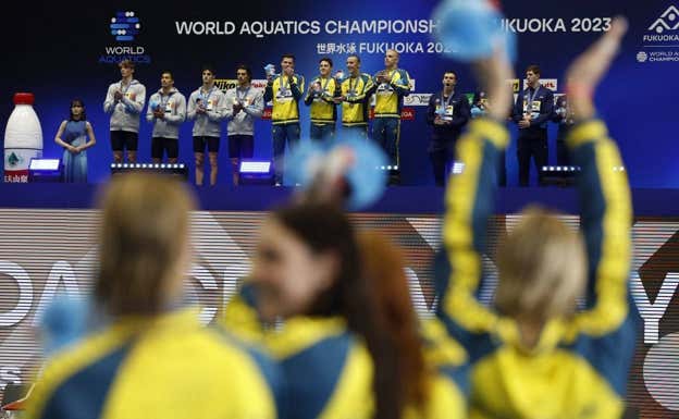 Los relevos 4x100 masculino y femenino australianos se llevaron los oros.  REUTERS/Issei Kato