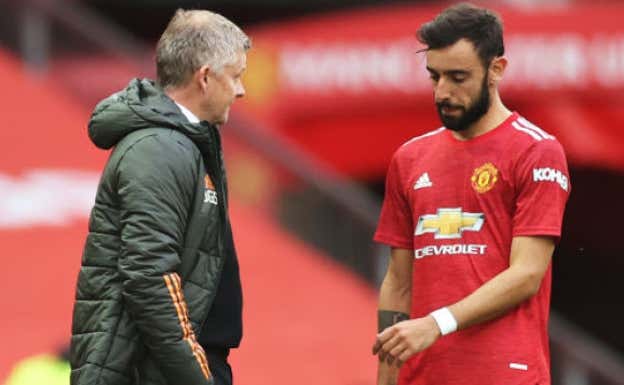 Ole Gunnar Solskjaer y Bruno Fernandes, durante un partido. EP