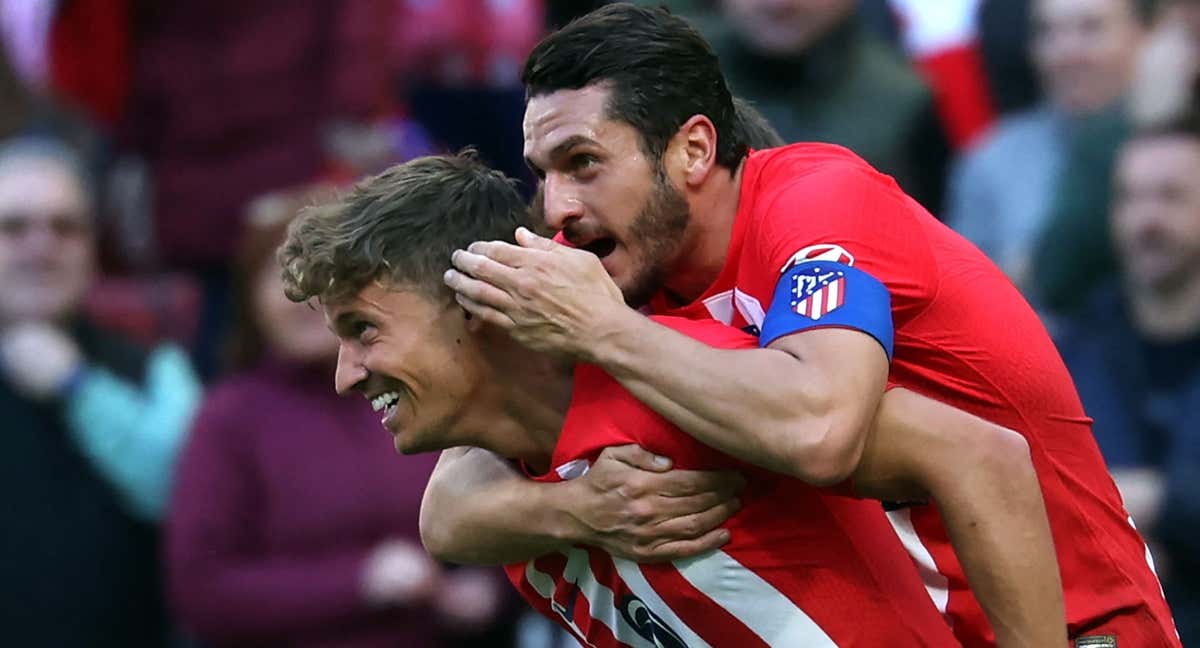 Llorente y Koke celebran un tanto. /AFP