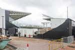 El fuerte viento derrumba parte del muro del estadio municipal de El Plantío en Burgos
