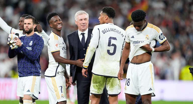 Vinicius, Ancelotti y Bellingham.