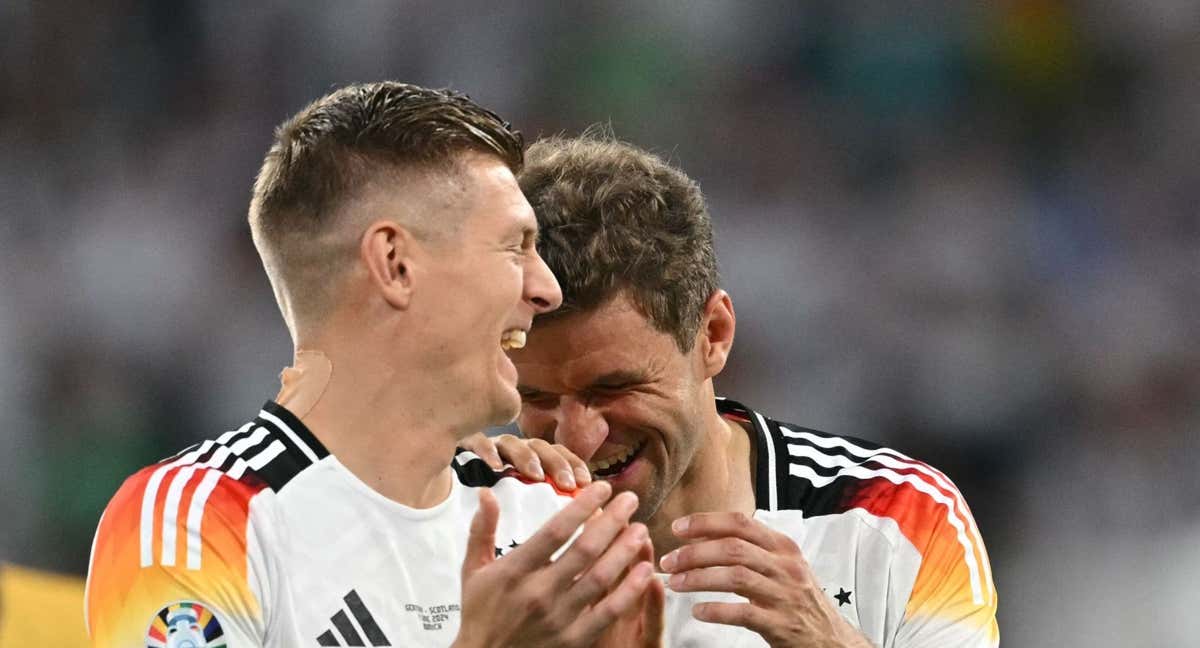 Kroos y Muller celebran la victoria./AFP