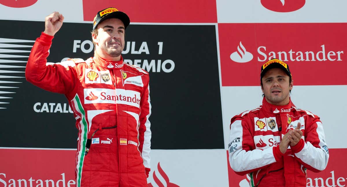 Fernando Alonso y Felipe Massa, en el podio de Montmeló con Ferrari en 2013.