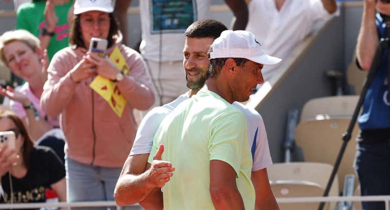 Rafa Nadal y Novak Djokovic, en un entrenamiento antes de Roland Garros.