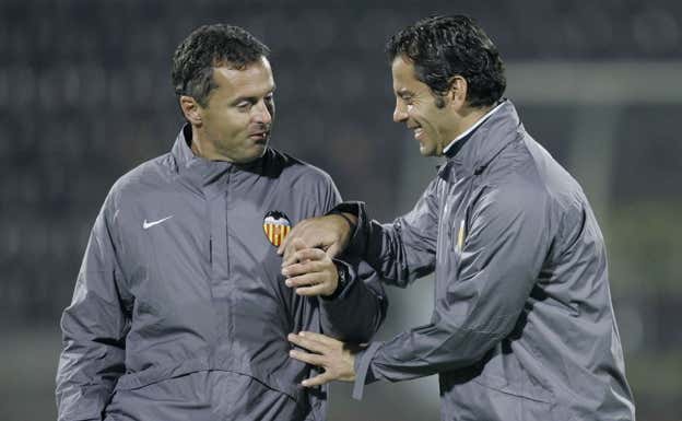 Fran Escribá junto a Quique en su etapa del Valencia.