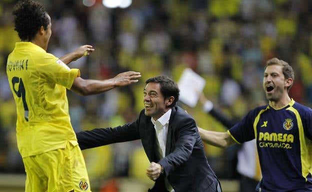 Marcelino y Giovani dos Santos, en el Villarreal. AFP