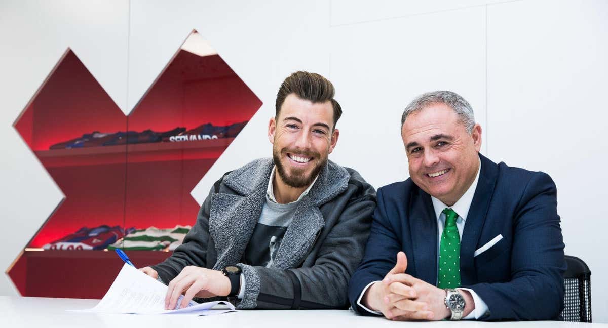 Eduardo Llanos, junto a Sergi Enrich.