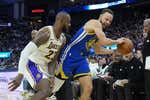 Austin Reaves decide sobre la bocina el 'show' entre LeBron James y Stephen Curry