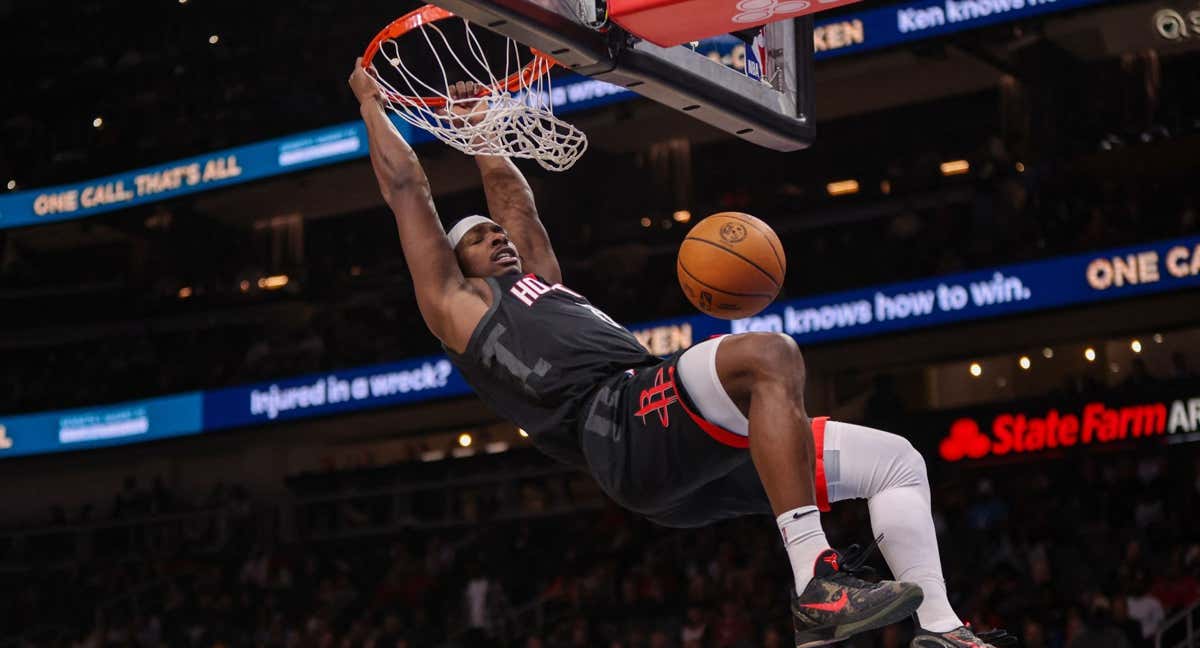 Jae'Sean Tate machaca en el partido de los Rockets ante los Hawks./AFP