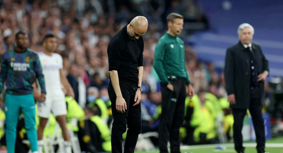 Pep Guardiola, cabizbajo, en el 3-1 del Real Madrid en 2022./Getty Images