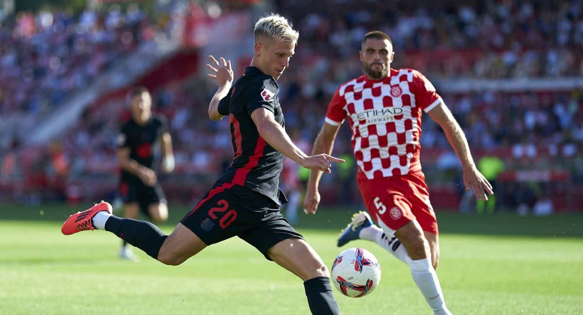 Dani Olmo y David López, rematando en un Girona-Barcelona. /GETTY